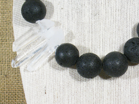 
LARGE BLACK LAVA BALLS AND 3 QUARTZ CRYSTALS WITH STERLING SILVER CLASP