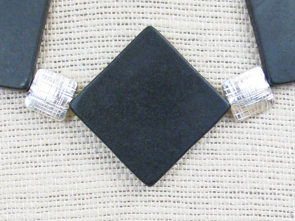 
BLACK ONYX LARGE FLAT SQUARES & STERLING SILVER WOVEN PATTERNED STERLING SQUARES WITH STERLING SILVER CLASP