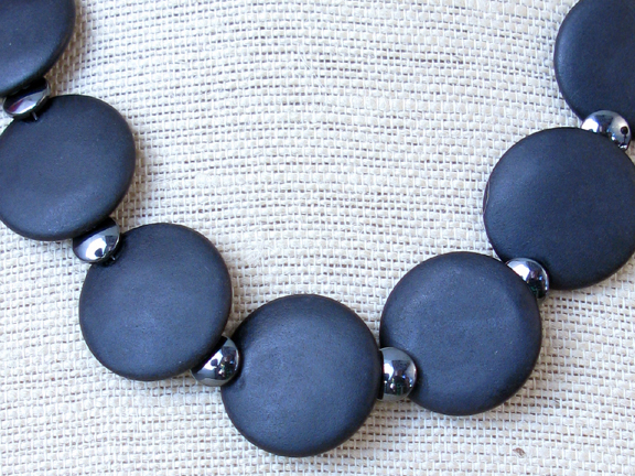 
ONYX AND HEMATITE DISKS WITH STERLING SILVER CLASP