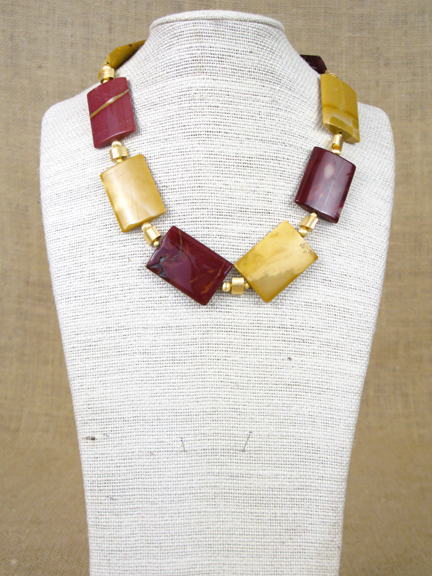 
GOLD AND BURGUNDY JADE WITH GOLD VERMEIL OVALS & CLASP