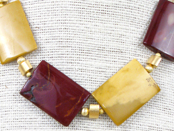 
GOLD AND BURGUNDY JADE WITH GOLD VERMEIL OVALS & CLASP