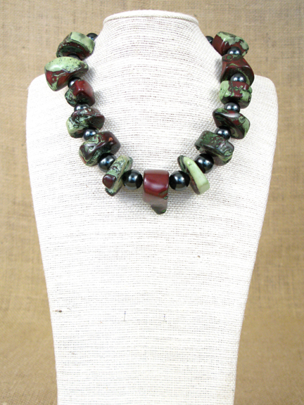 
GREEN & BURGUNDY CORAL & DARK GREEN SHELL PEARLS WITH GOLD VERMEIL CLASP
