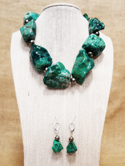 
TURQUOISE COLORED CHRYSOCOLLA WITH PYRITE