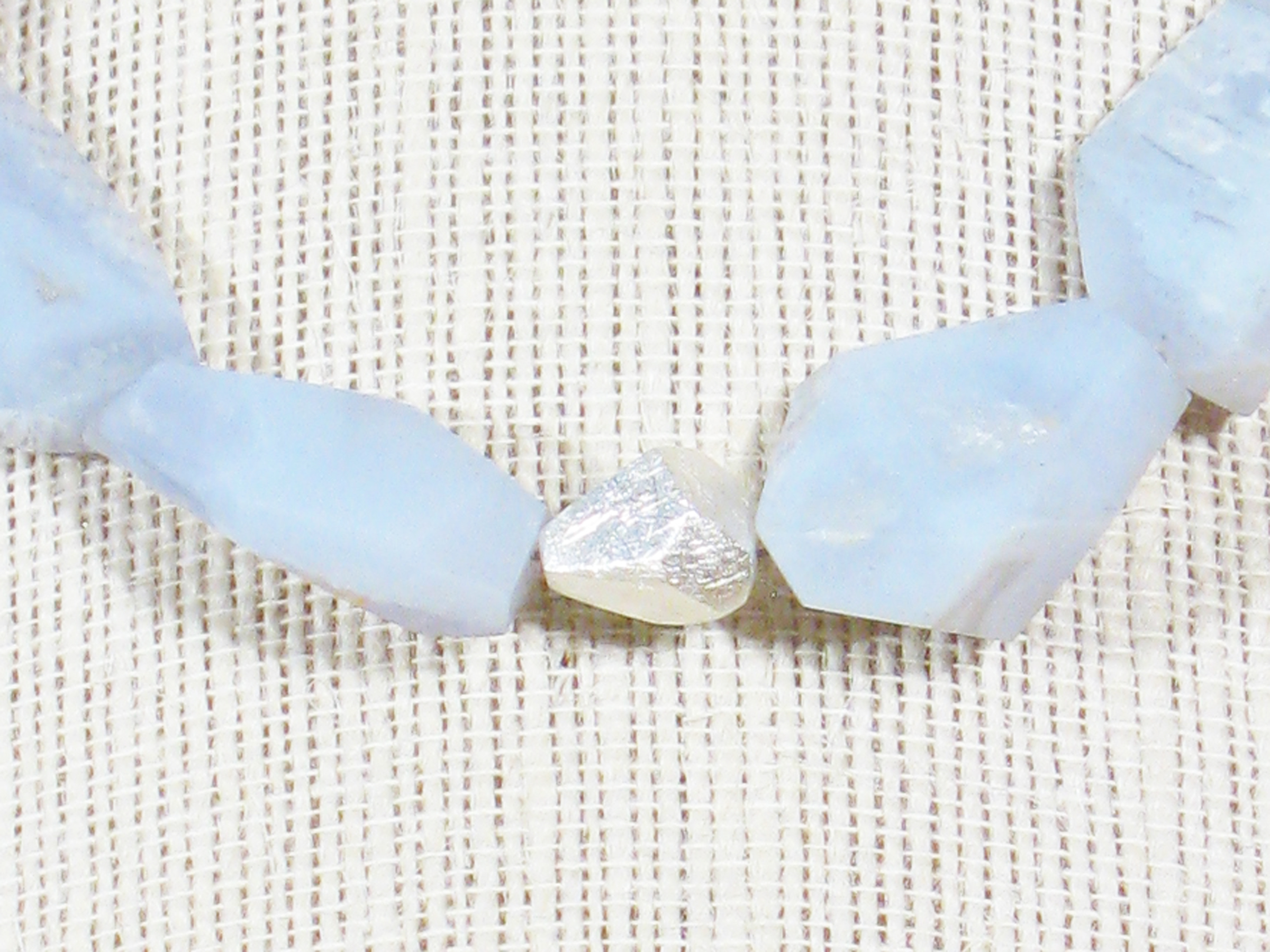
BLUE CHALCEDONY & STERLING SILVER FACETED NUGGETS WITH STERLING CLASP