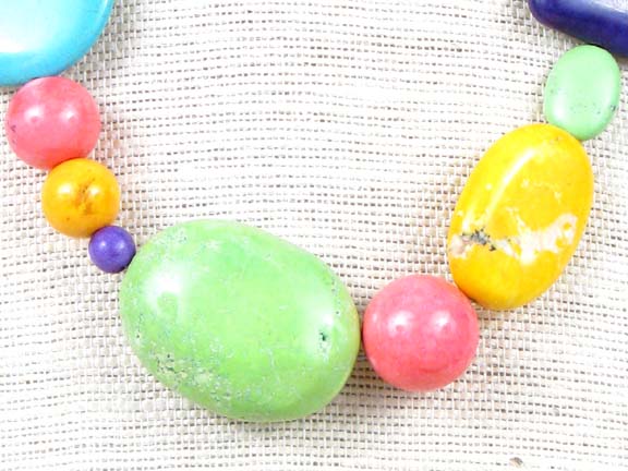 
PINK, PURPLE, GREEN, YELLOW, TURQUOISE COLORED MAGNESITE WITH STERLING SILVER CLASP