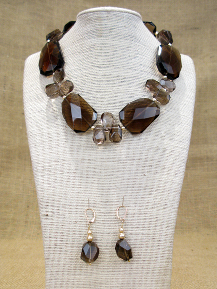 
SMOKEY QUARTZ WITH GOLD PLATED BALLS AND CLASP