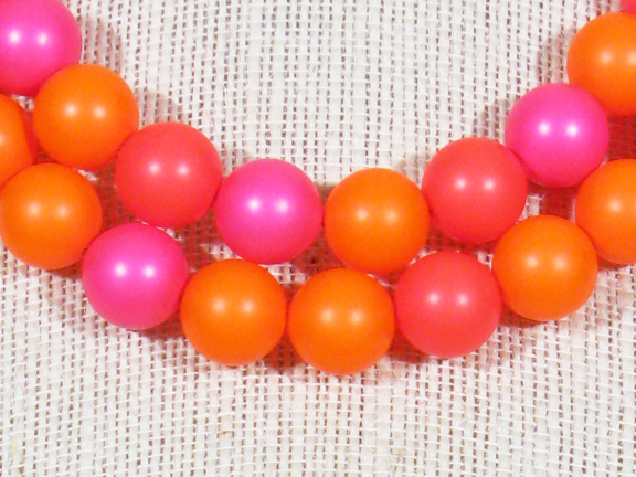 
NEON ORANGE, PINK AND RED SWAROVSKI GLASS WITH STERLING CLASP