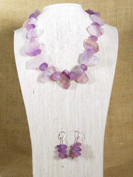 
PURPLE FLUORITE WITH A STERLING SILVER CLASP