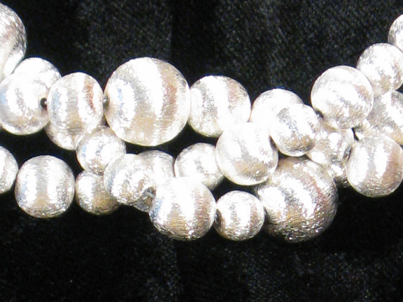 
3 STRAND GERMAN SILVER BRUSHED BALLS WITH STERLING SILVER CLASP