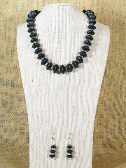 
BLACK ONYX AND STAINLESS STEEL NUTS WITH STERLING CLASP