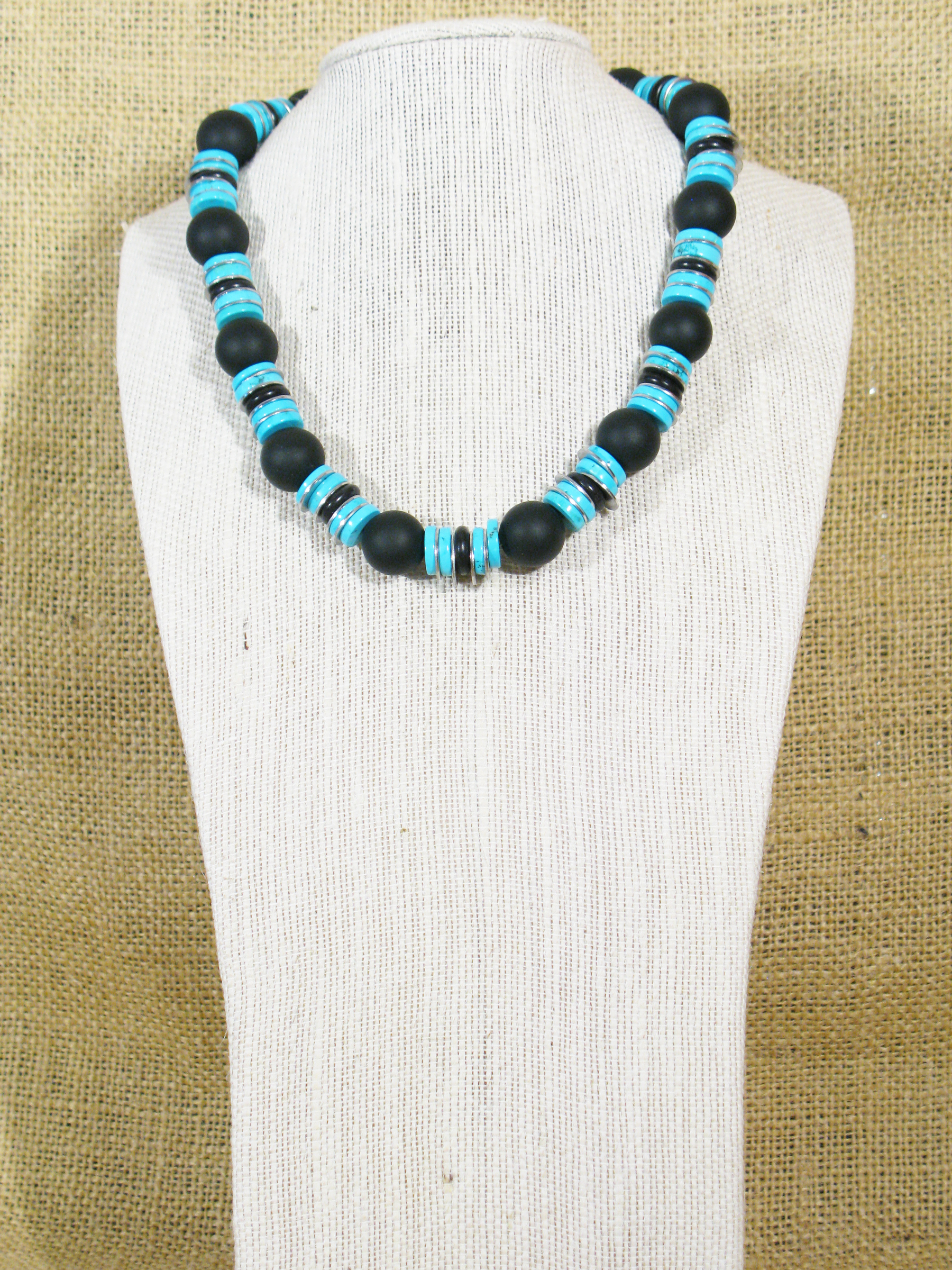 
BLACK AGATE, TURQUOISE HOWLITE, & STAINLESS STEEL NUTS WITH STERLING CLASP