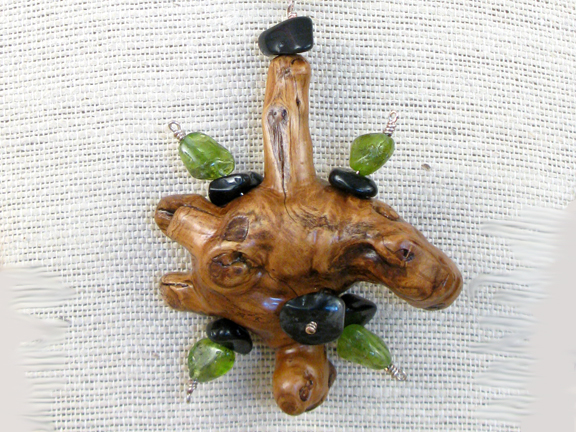 
BURLED ROOT WITH PERIDOT AND ONYX