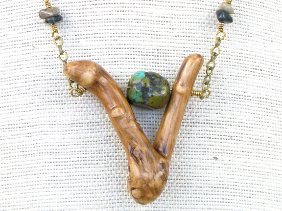 
BURLED ROOT WITH TURQUOISE STONE WITH BRONZE CHAIN