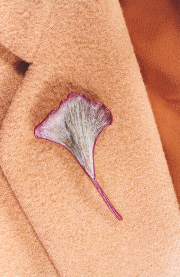 GINKGO PIN ON A CAMEL HAIR BLAZER